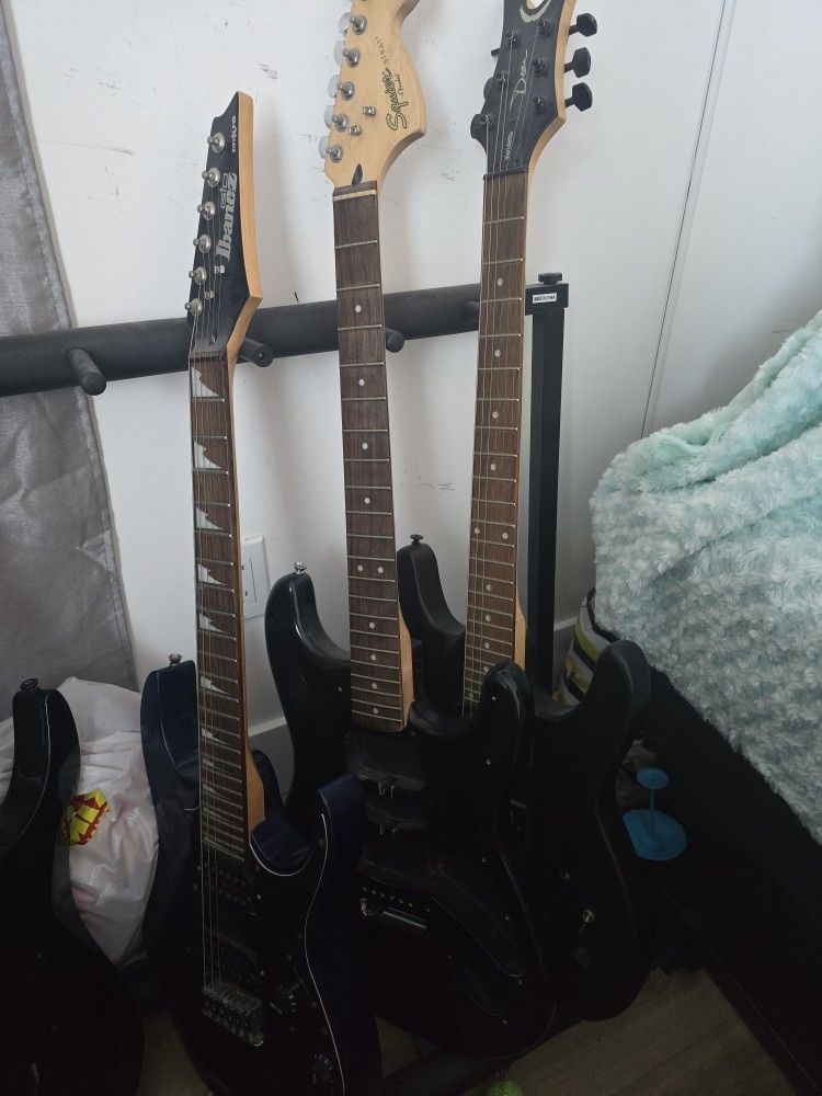 Three project guitars Ibanez Squier Dean