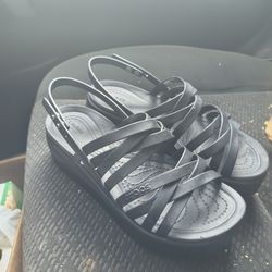 Woman's crocs sandles lightly used $135 new price