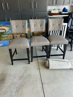 Three high bar chairs
