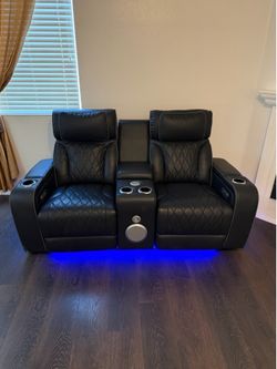 Reclining couches. Black leather. Bluetooth