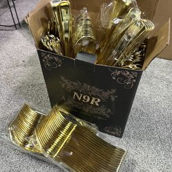 Gold plastic event utensils, very durable