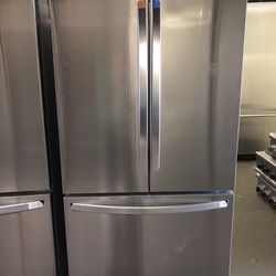 LG Stainless Steel French Door Refrigerator With Interior Water Dispenser And Ice Maker Inside Freezer 