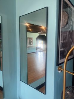Rectangular metal framed mirror