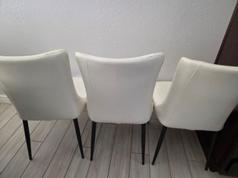 Faux white leather dining room chairs