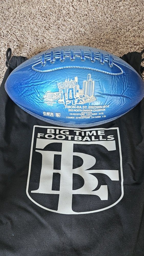 AMON RA ST. BROWN AUTOGRAPHED FOOTBALL