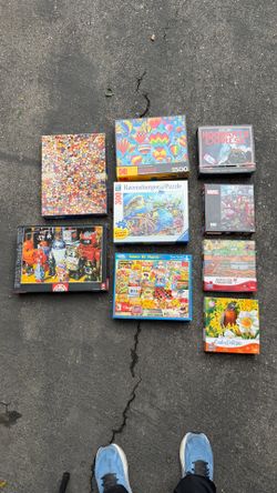 Colorful Lot of Nine Jigsaw Puzzles (300 to 1500 Pieces)