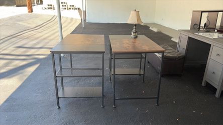 Two small metal and wood desks
