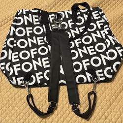 ONE OF ONE TOTE BAG WITH STRAPS TO HANG ON BACK 