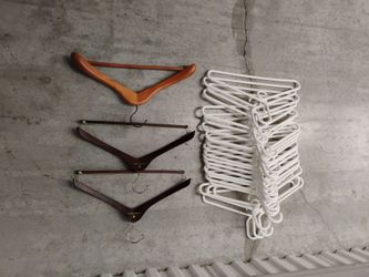 23 New Heavy Duty Plastic Hangers + 3 wood units