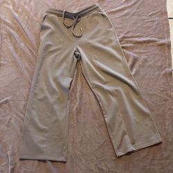 Stylish tan wide-leg pants. Comfortable and versatile.