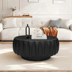 Round Black Coffee Table with Ribbed Base