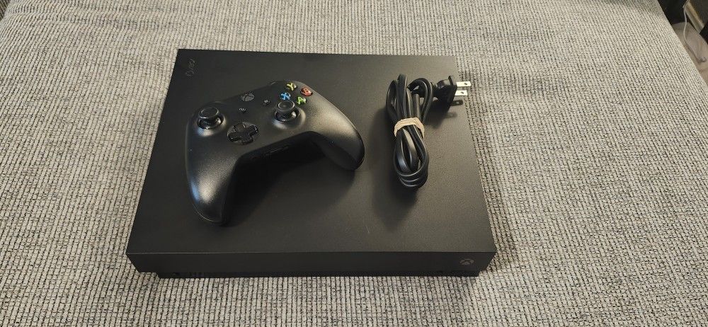 Xbox ONE X - Adult Owned