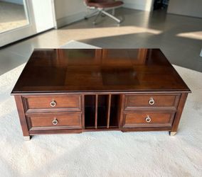Solid mahogany wood Pop- up coffee table with drawers .