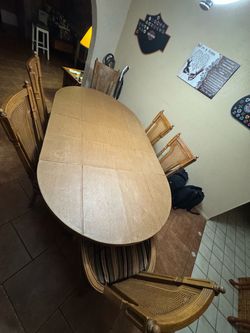 Wood Dining Table with Cane Back Chairs