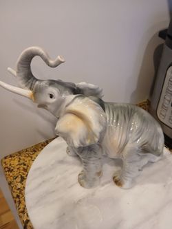 Porcelain Elephant Figurine with Raised Trunk