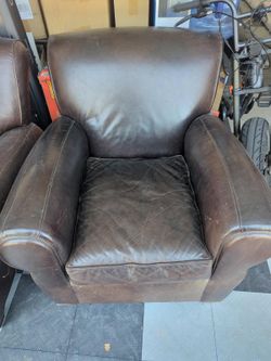 Selling 2 Pottery barn leather chairs and ottoman for sale slightly used