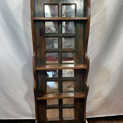 Solid wood mirrored wall hanging bookcase.