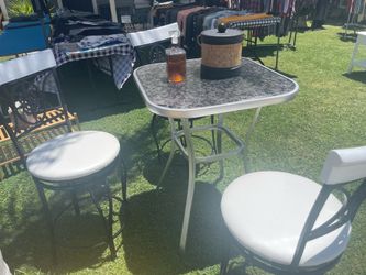Bar table with bar stools