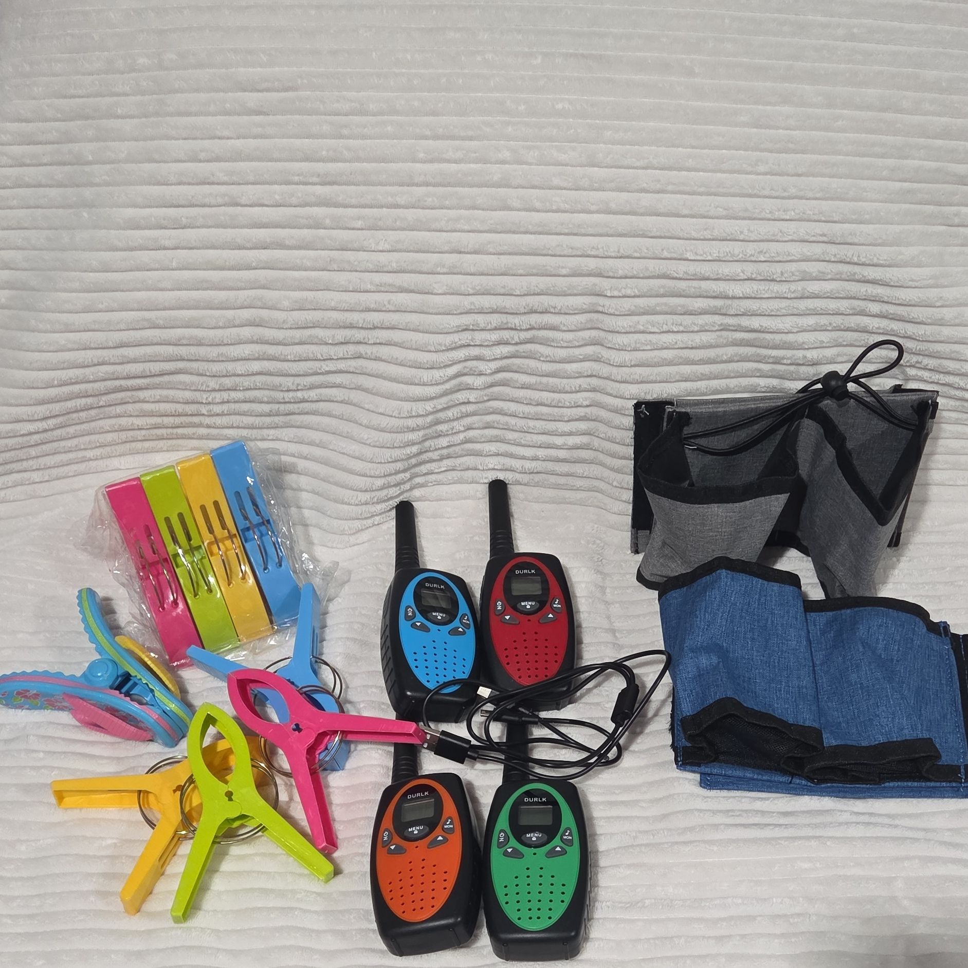 Suitcase cup holder, towel clips, walkie talkie