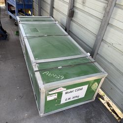 Big Tarp that can be placed between 2 containers .