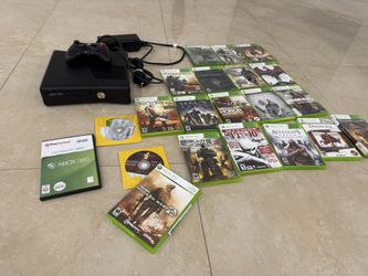 Xbox 360 with 21 discs
