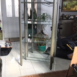 Two Sturdy Metal And Glass Shelving Units          64in. H X32in