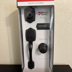 Kwikset Belleview and Cove venetian bronze entry door knob handleset