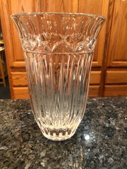 Vintage Heavy Lead Crystal Vase.  Beautiful design, the top design has tulips.  Size 9 inches tall and 6 inches wide across the rim.  Preowned excelle