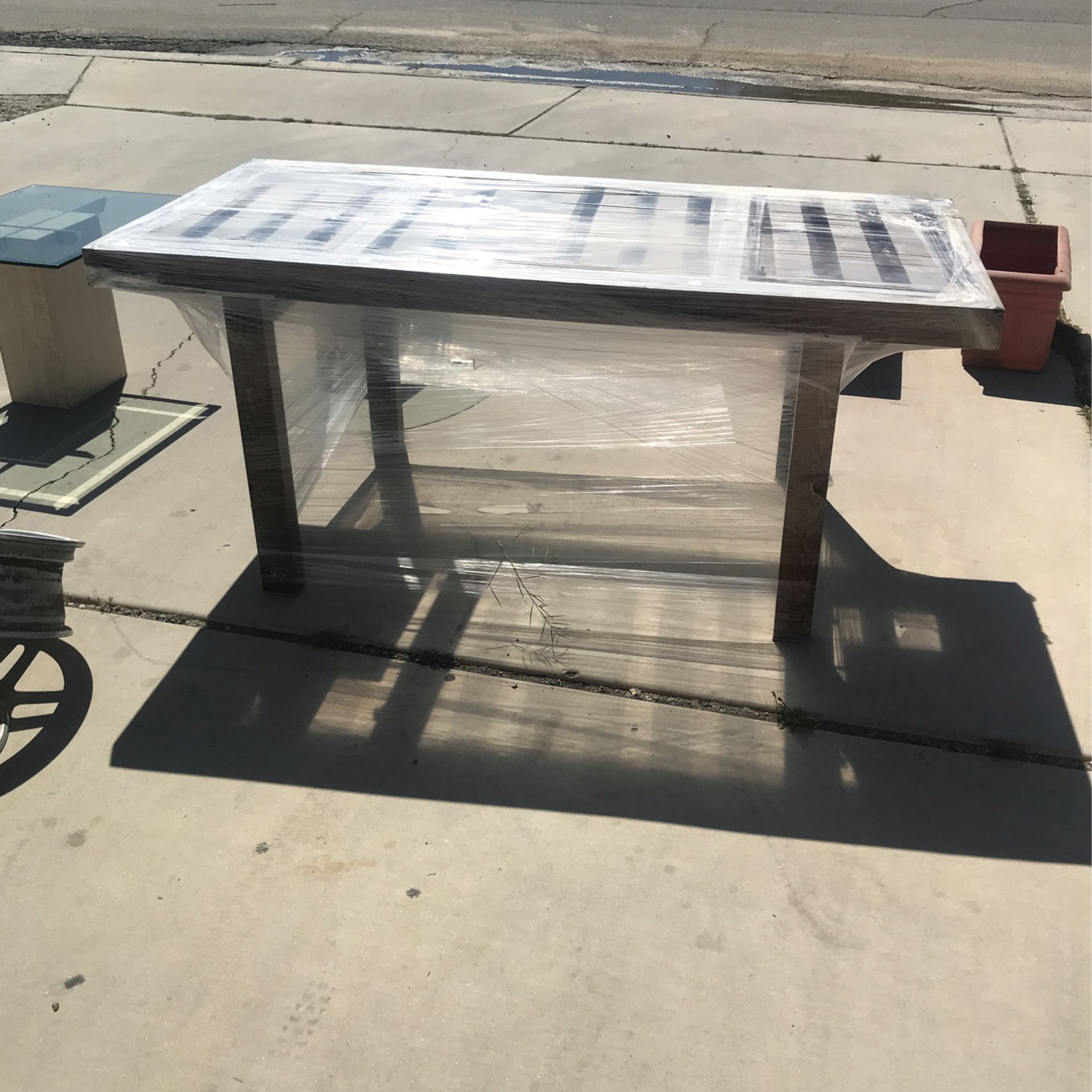Kitchen table with a slab of glass