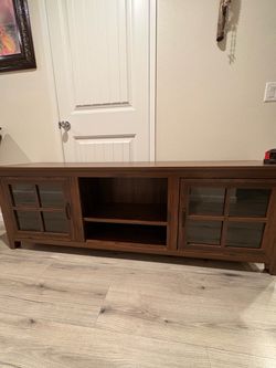 Brown Wood TV Stand with Glass Door Cabinets