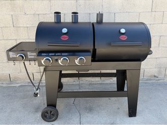 Asador de gas y carbón , no incluye tanque