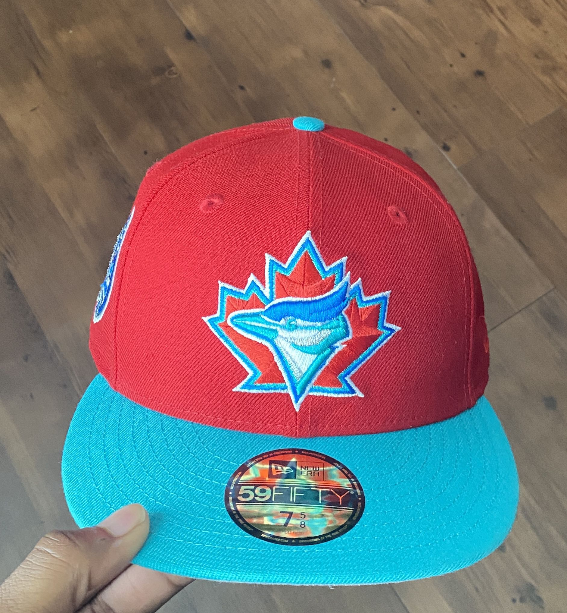 1(contact info removed) TORONTO BLUE JAYS 30TH SEASON RED ON BLUE HAT 
