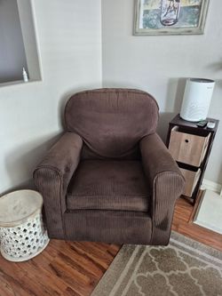 Dark brown rocking chair