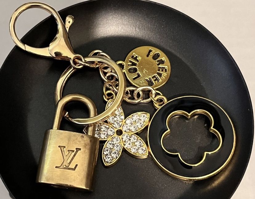 Louis Vuitton locket keychain as new never worn