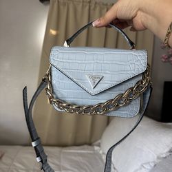 sky blue crocodile Guess purse