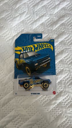 2025 Hot Wheels ‘87 Dodge D100 58th Anniversary Blue & Gold Chrome