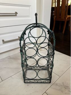Wine rack holds 7 bottles of wine