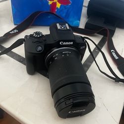 Mirrorless  Cannon EOS R100