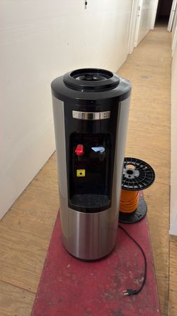 Top loading water dispenser used item as is
