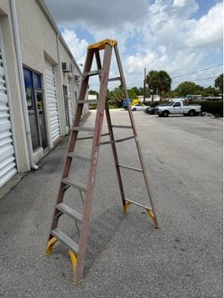 Werner 8-Foot Fiberglass Folding Step Ladder! Sturdy. Fiberglass is flaking some. Retails $209