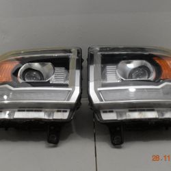 GMC OEM Used Headlights Pair 