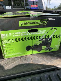 New In Box- Greenworks Pro 60v self-propelled 25” cordless electric lithium ion mower with 2 batteries and charger