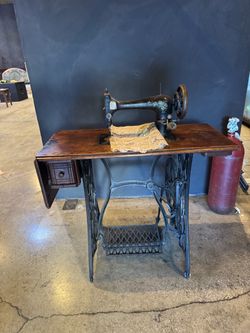 Antique Treadle Sewing Machine with Cabinet