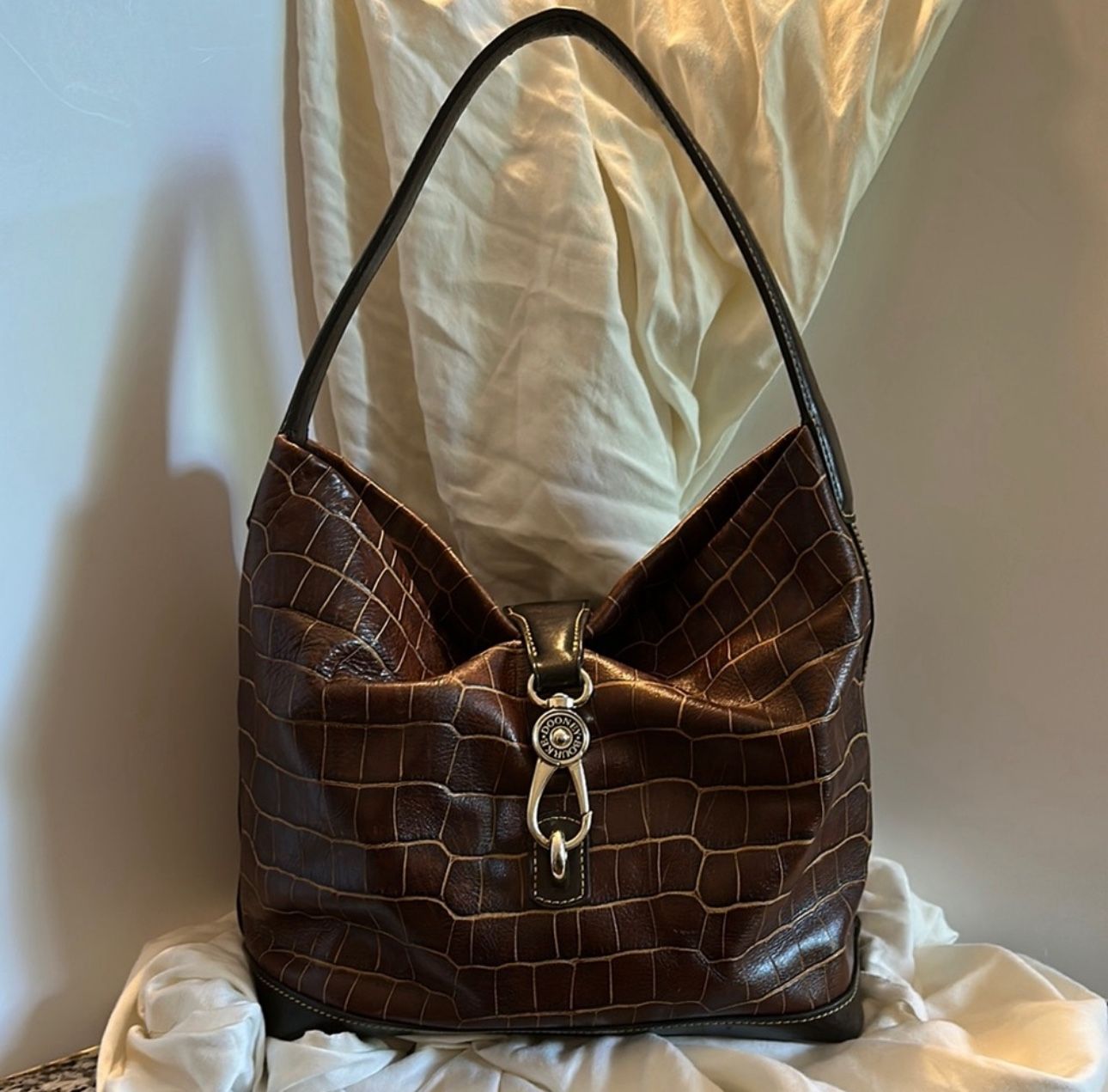 Dooney and Bourke Elegant Brown Florentine embossed Bag