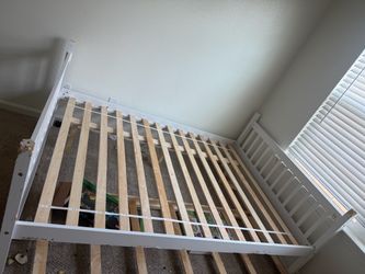 Full size bed with bottom that pulls out