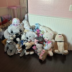 three Bags Of Stuffed Animals 