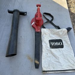 Toro 12 Amp Blower / Yard Vac With Leaf Bag And Vacuum Attachments.
