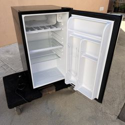 Small Fridge With A Small Freezer In Excellent Condition   171/2  Inches Wide   19” Side   30” High 
