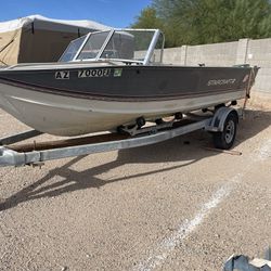 18foot 1989 StarCraft aluminum boat with easy loader trailer 70 HP Evinrude