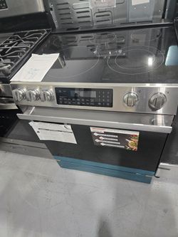 Brand New Sharp Electric Slide In Range